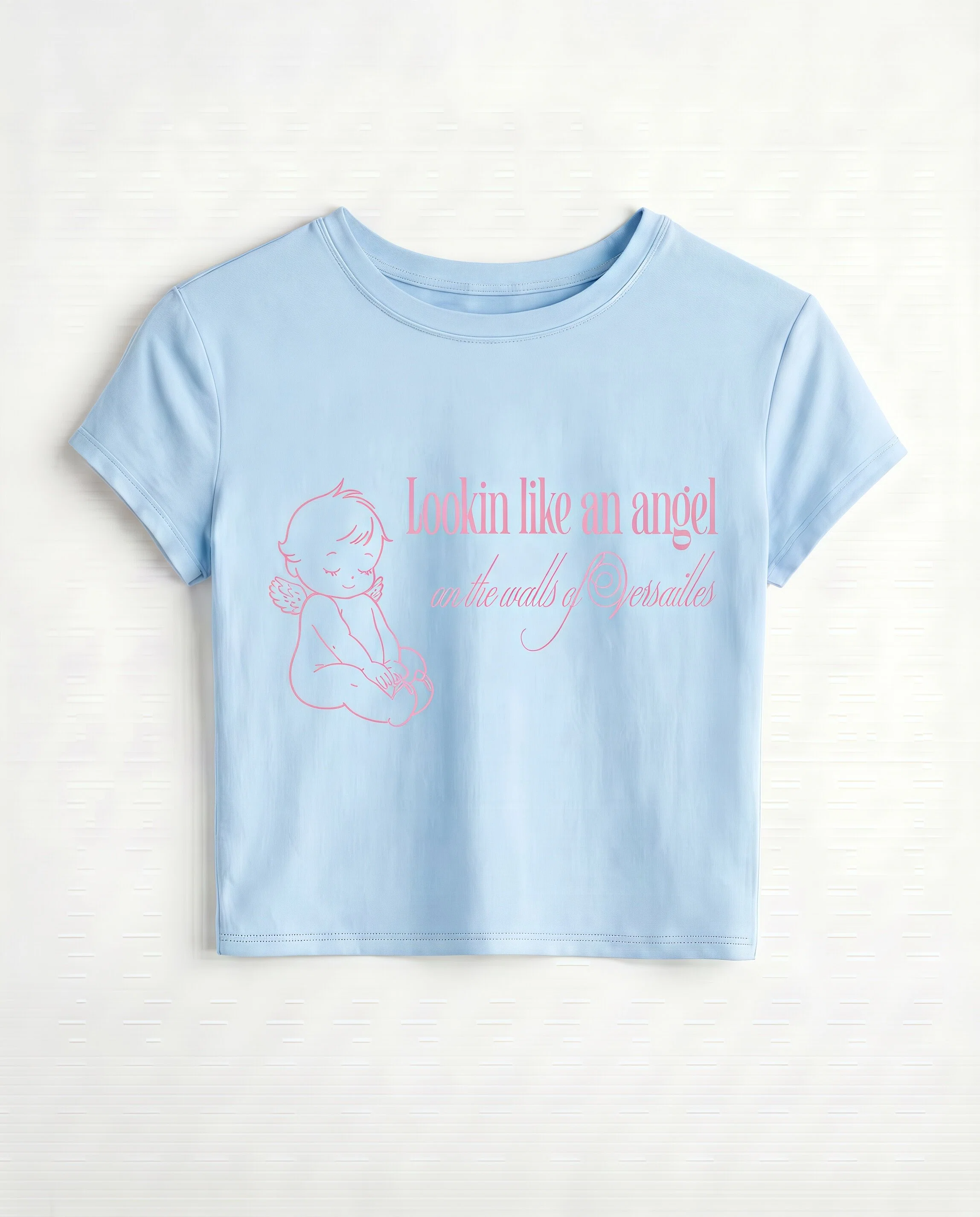 looking like an angel baby tee